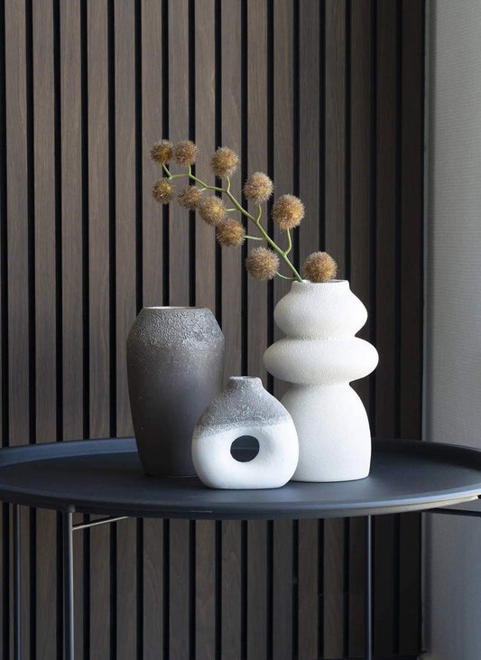 Beige rund vas 14,5x26,5 cm.